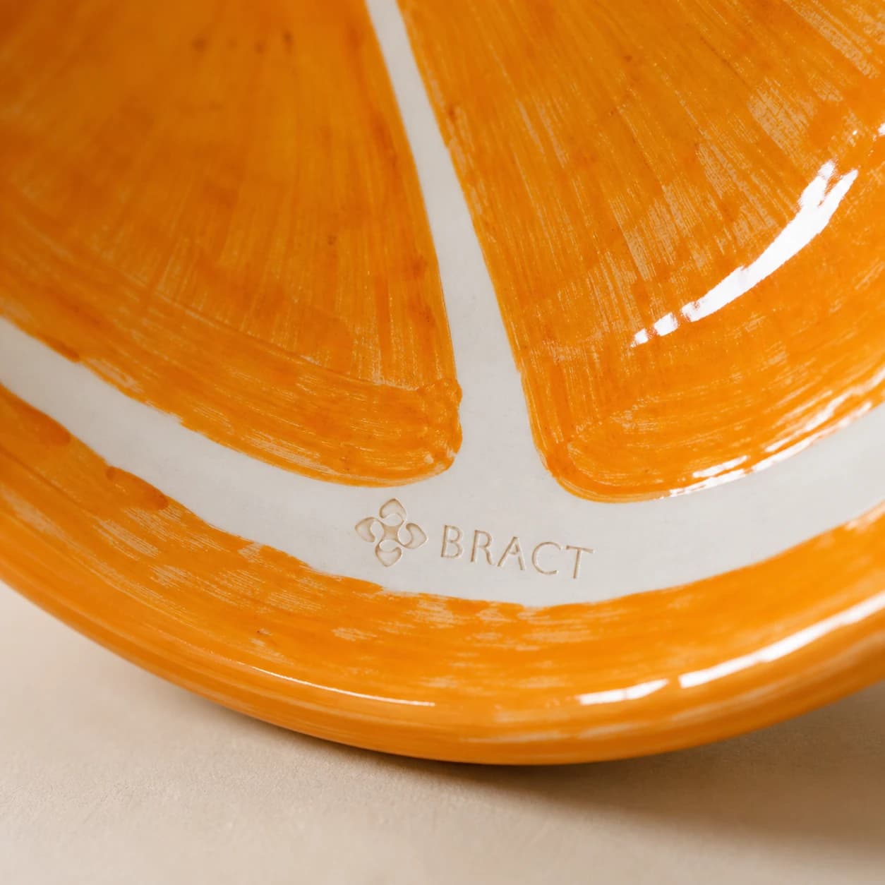 Citrus Sun Plate — BRACT engraved detail