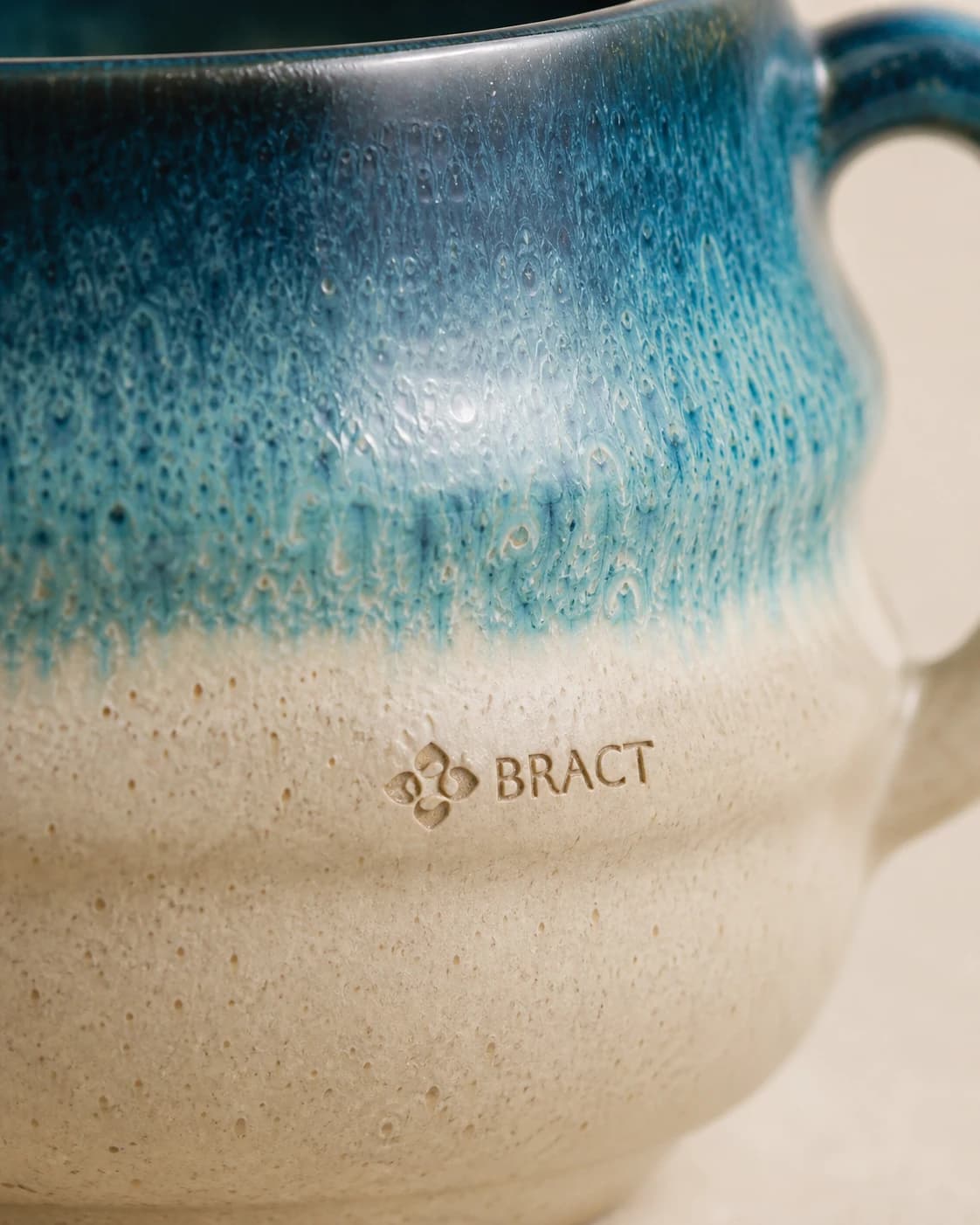 Lagoon Round Mug — BRACT engraved detail