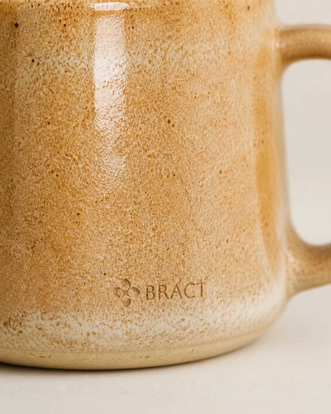 Sandstone Mug — BRACT engraved detail