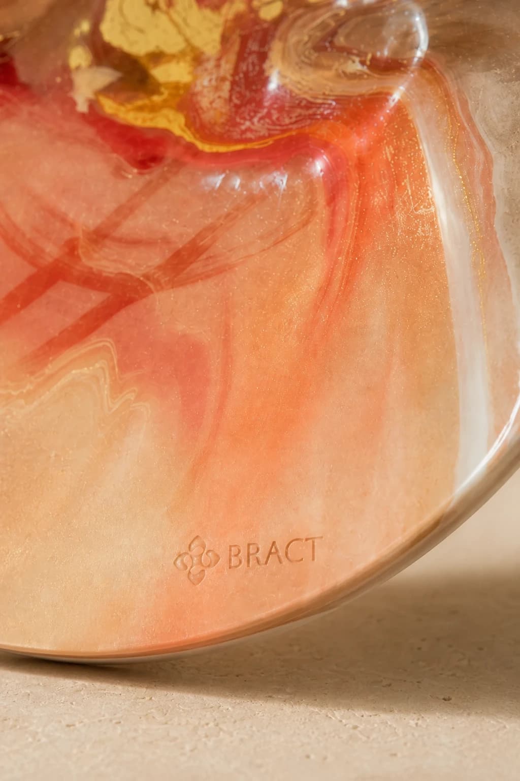 Sunset Swirl Plate — BRACT engraved detail