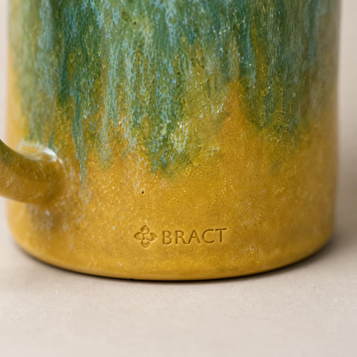 Verdigris Drip Mug — BRACT engraved detail