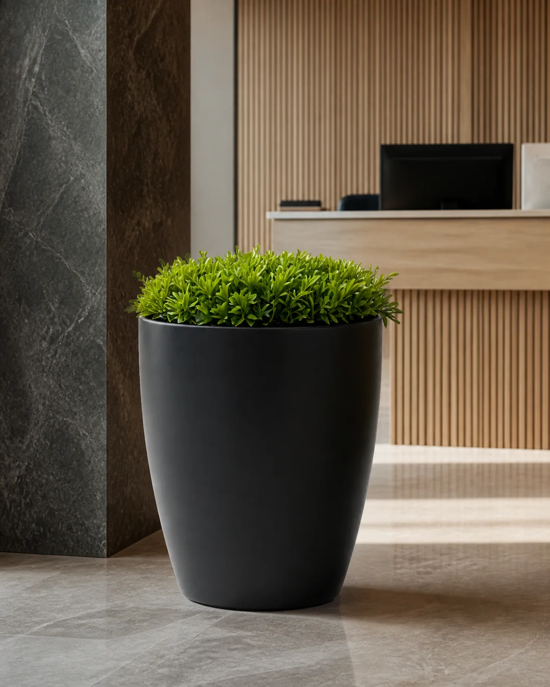 Noir Round Planter — in a real space